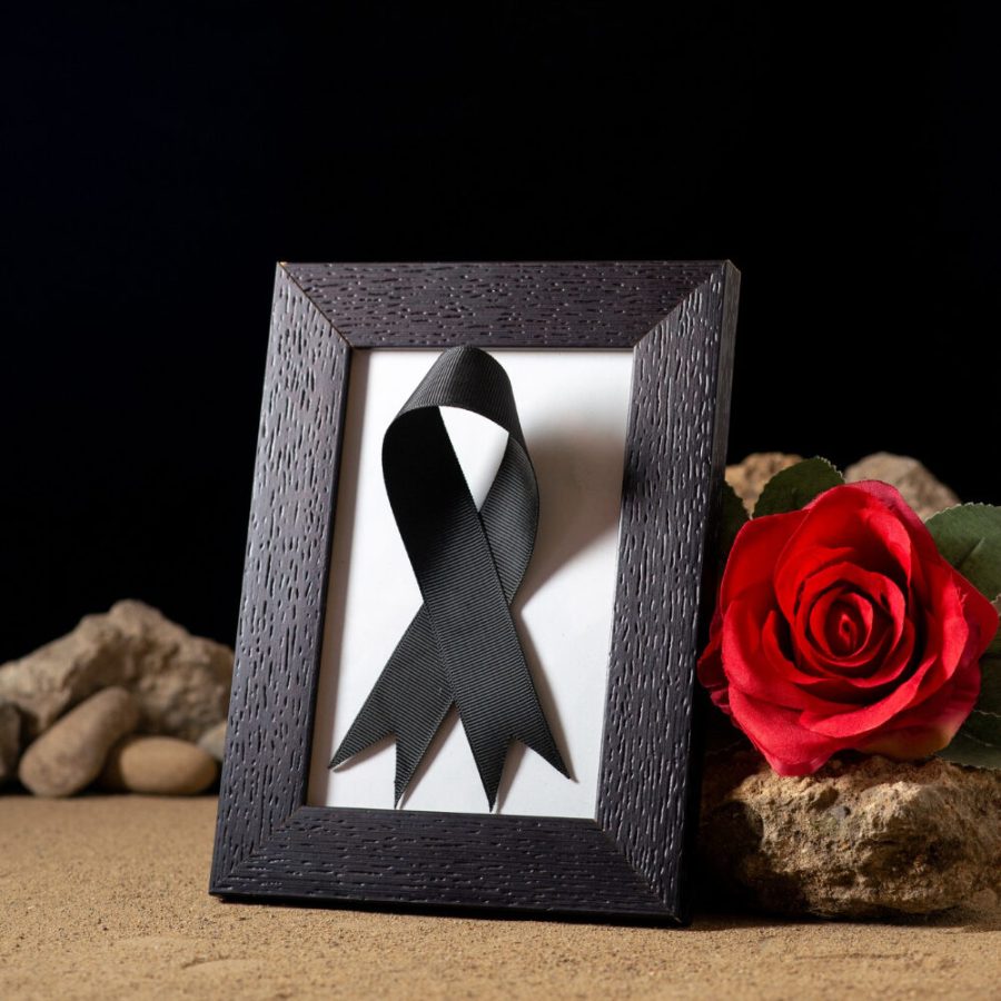 front-view-empty-picture-frame-with-red-flower-stones-black-e1700641708445